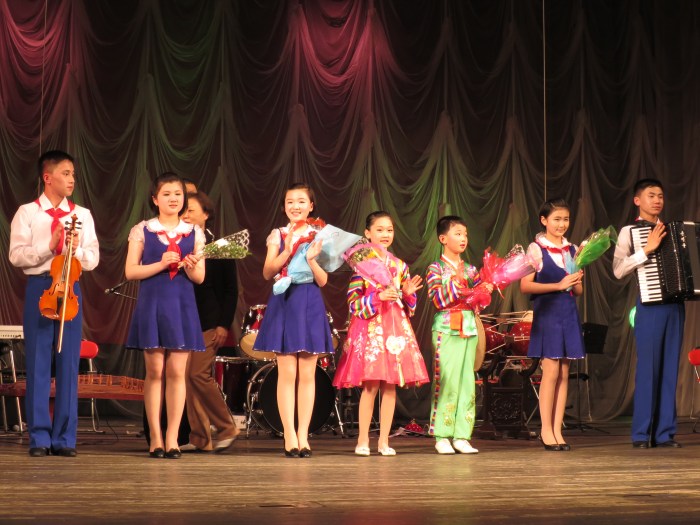 A performance by schoolchildren for tourists. 