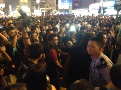 The author took this photo moments before a confrontation between police and protesters in Hong Kong in the largest democratic demonstration the city  has seen since its handover to Beijing. 